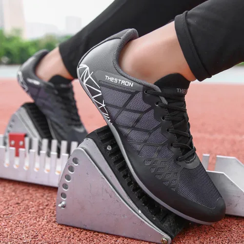 Vista 6 de Tenis de correr para hombre y mujer con Spikes Athletics Racing Track and Field Negro Gris