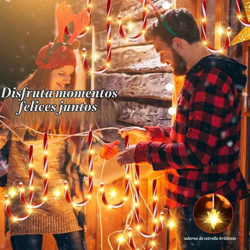Vista 4 de Paquete de 12 luces solares de bastón de caramelo para decoración de Navidad al aire libre, impermeables, con estrella y LED brillante, 8 modos
