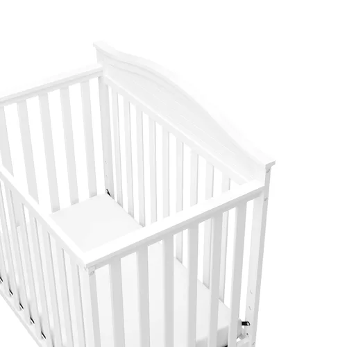 Vista 5 de Graco Stella: Cuna convertible mini 4 en 1 con colchón adicional (blanco) – Incluye colchón adicional de 2.75 pulgadas de grosor con cubierta