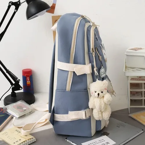 Vista 9 de Rcuyyl Mochila Kawaii con dijes y pines de accesorios, juego de 5 unidades, bonita mochila para mochila escolar, mochila de viaje de 17 pulgadas