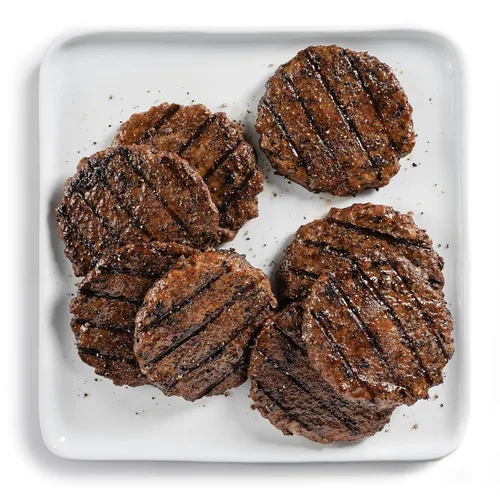 Vista 7 de Omaha Steaks PureGround® Burger Flight, 24 Artículos: 8 Hamburguesas Smash, 4 Filets Mignons, 4 Solomillos, 4 Porterhouse, 4 Tiras de Nueva York