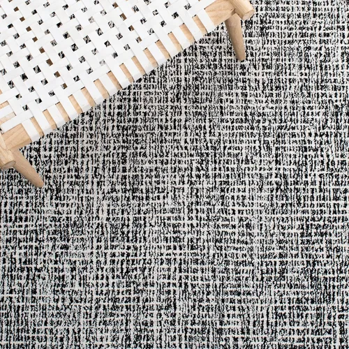 Vista 5 de SAFAVIEH Abstract Collection - Alfombra decorativa, 2 x 3 pies, color negro y marfil, lana hecha a mano, ideal para zonas de alto tráfico