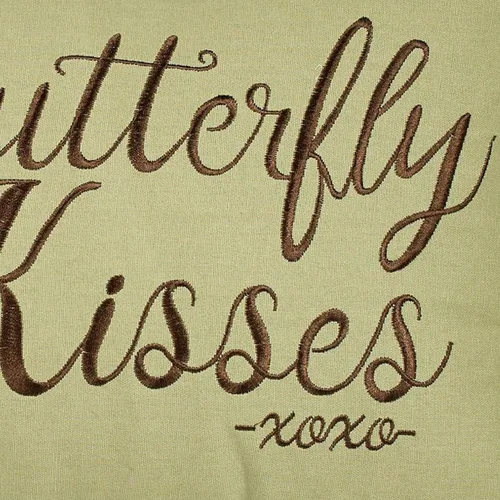 Vista 3 de Butterfly Eden - Almohada bordada de besos de mariposa, verde musgo, 14 x 20 pulgadas Mariposa bordada y palabras en rectángulo verde musgo