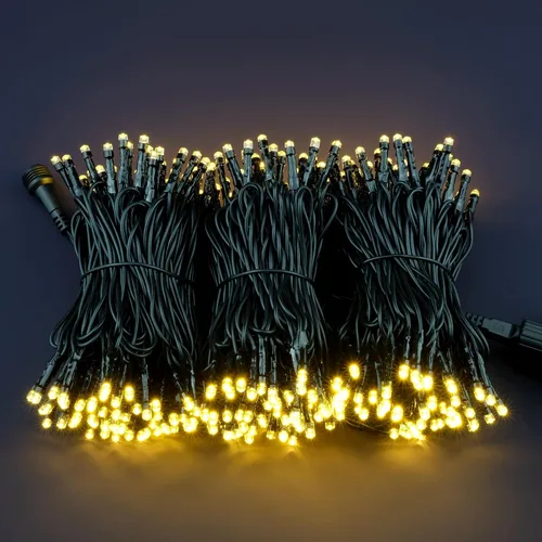 Vista 2 de Cadena de 300 luces LED de Navidad de color blanco cálido, 30.5 metros de luces LED de gran angular de 5mm con adaptador de 8 modelos (cable negro)