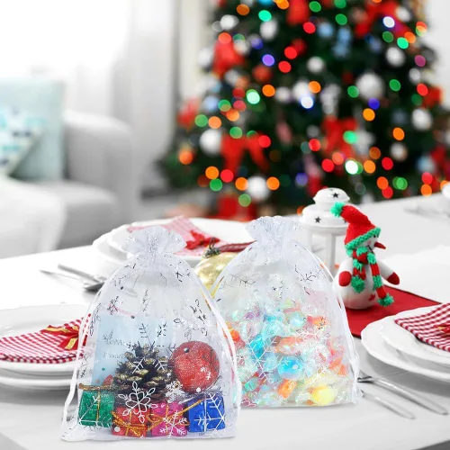 Vista 5 de HRX Package 100 bolsas de organza de copo de nieve de Navidad de 5 x 7 pulgadas, bolsas de regalo de malla con cordón blanco para joyas, dulces