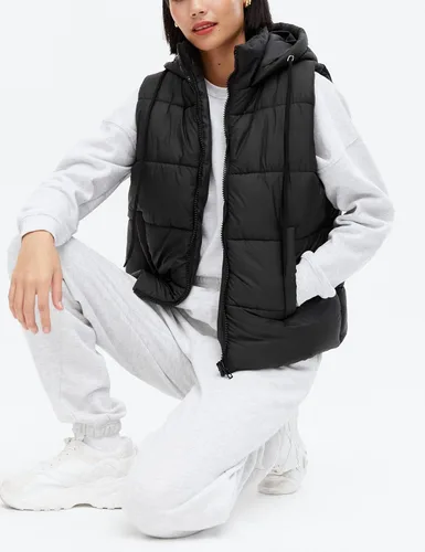 Vista 2 de EsheSy Chaleco acolchado para mujer con capucha extraíble, sin mangas, con cremallera completa, chaqueta acolchada de plumón