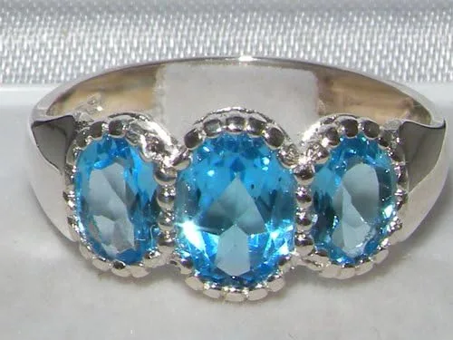 Vista 4 de Anillo de plata de ley 925 con topacio azul auténtico para mujer