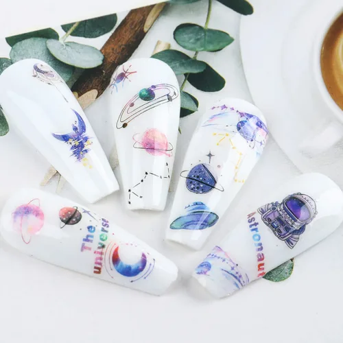 Vista 4 de Calcomanías de arte de uñas alienígenas, astronauta, tierra, luna, estrella, ovni ojos de cohete, diseños de calcomanías autoadhesivas para uñas