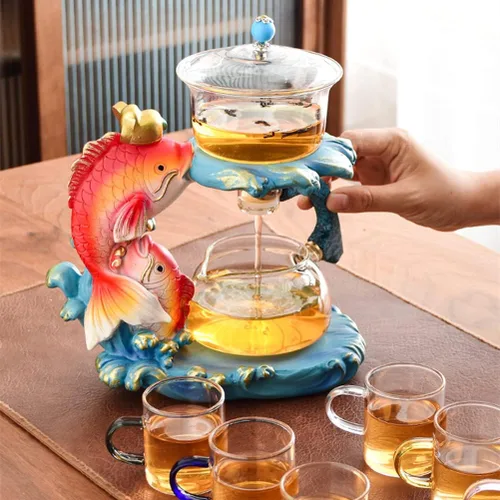 Vista 7 de Juego de té semiautomático creativo de cristal, juego de tazas de té Lazy Kung Fu resistente al calor, tetera de tetera (tetera de pescado)