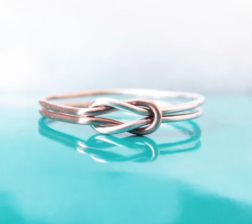 Vista 3 de Anillo de doble nudo de amor de plata de ley y oro rosa