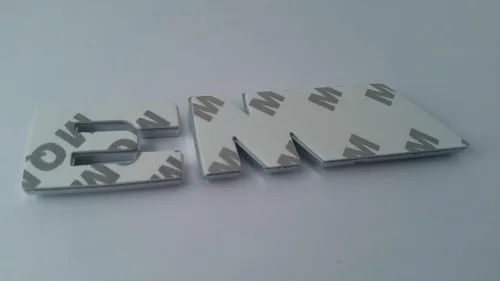 Vista 3 de Nuevo emblema original de BMW adherido trasero (2001-2006) OE 51147893655