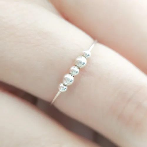 Vista 3 de Anillo de plata de ley para aliviar el estrés y la ansiedad, anillo giratorio ajustable con cuentas de metal