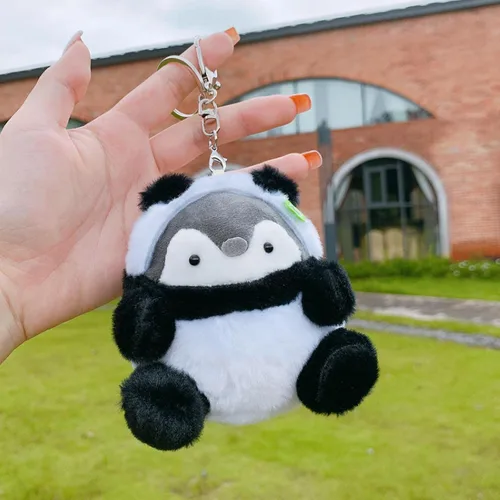 Vista 2 de Lindo llavero de pingüino Kawaii con diseño de pingüino de peluche para hombres, mujeres, niños. Colgantes de mochila..