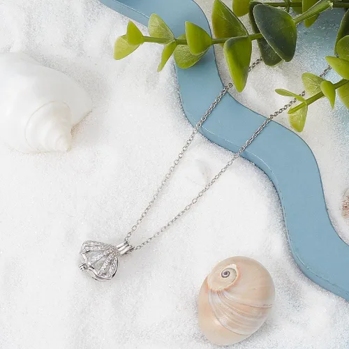 Vista 4 de Beebeecraft Jaula de perlas de plata de ley con forma de concha de mar, dije de jaula con circonita cúbica para pulseras, collares, aretes, joyería