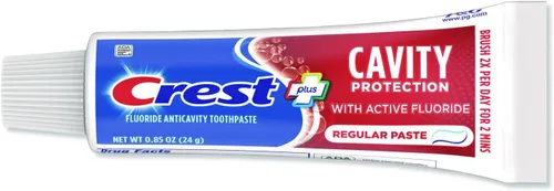 Vista 5 de Crest Cavity Protection Pasta de dientes regular, tamaño de viaje, 0.85 oz (24 g) - Paquete de 4