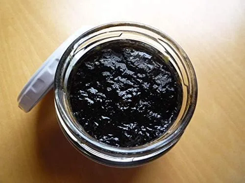 Vista 2 de Takesan Tsukudani de algas marinas en botella. TUKUDANI es un alimento conservado elaborado con salsa de soja. Una comida tradicional japonesa que