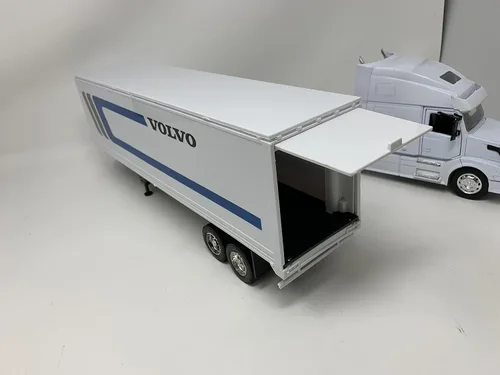 Vista 3 de NewRay tractor y remolque Volvo VN-780, escala 1/32. Modelo prearmado de camión con semi color blanco