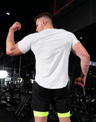 Vista 5 de Pinkbomb Camisetas musculares para hombre, de manga corta, para entrenamiento, gimnasio, ajustadas, para hombre