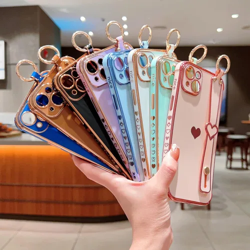Vista 5 de DEFBSC Funda compatible con iPhone 15, con borde galvanizado, diseño de corazón con correa para la muñeca, protección completa de la cámara