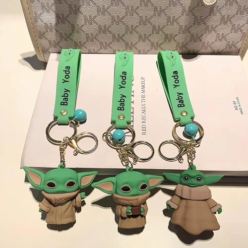Vista 4 de Zmioviq Bonito llavero para hombres y niños, colgante de dibujos animados con campana pequeña, mochila de moda para decoración de automóvil