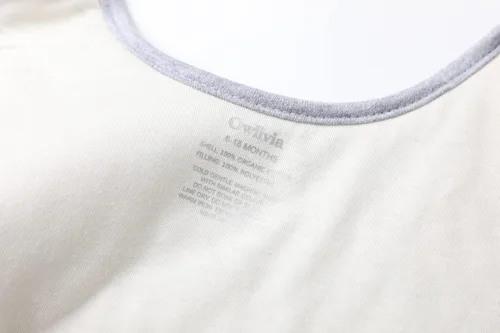 Vista 4 de Owlivia TOG 2.5 - Saco de dormir para bebé, 100% algodón orgánico, manta unisex para invierno (0-6 meses, conejo blanco)