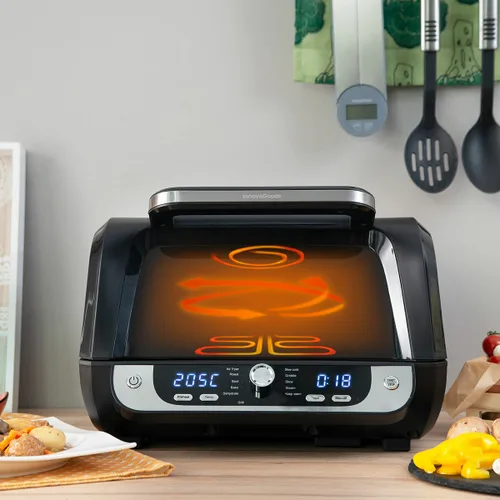 Vista 3 de Freidora de Aire con Grill, Accesorios y Recetario InnovaGoods Fryinn 12-in-1 6000 Negro Acero 3400 W 6 L