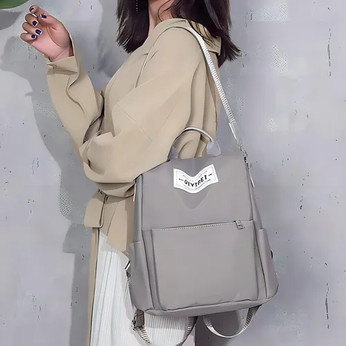 Vista 8 de CHARMORE Elegante mochila antirrobo para mujer, mochila de nailon impermeable casual para viajes, Gris-S