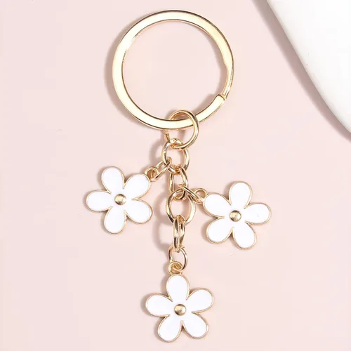 Vista 6 de Homvog 4 llaveros de flores lindos para mujer, llaveros de flores, dijes de borlas, colgantes esmaltados, llavero de borla, regalo de cartera