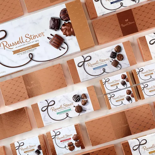 Vista 5 de Russell Stover, Nueces cubiertas de chocolate con leche, caja de regalo de chocolate surtido, 9 onzas