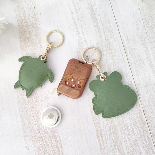 Vista 22 de CATCH ON Paquete de 2 fundas de cuero para Airtag para llavero, bonitos accesorios Kawaii adecuados para Airtag