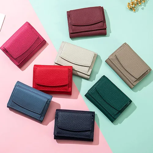 Vista 2 de Mini cartera unisex con bloqueo RFID con bolsa para monedas, bolsillo organizador de fraude de tarjetas de crédito, plegable, delgado y compacto