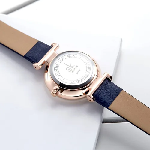 Vista 5 de SHENGKE - Reloj de pulsera para mujer con correa de piel Decent Casual Geneva a prueba de agua para mujeres creativas