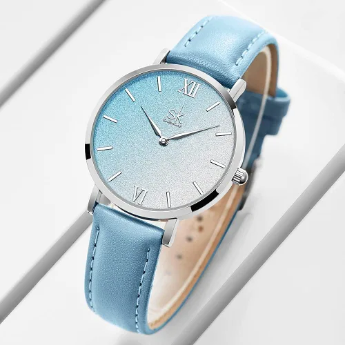 Vista 2 de SK Shengke - Reloj ultra delgado de creativo diseño minimalista, floral o de cielo estrellado con extensibles de piel genuina o acero