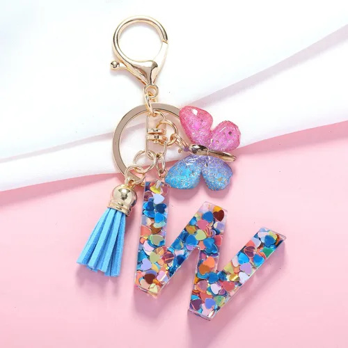 Vista 2 de Llavero de letra inicial del alfabeto de moda, borla y mariposa, llavero para bolso, bolsos de mano para mujeres y niñas