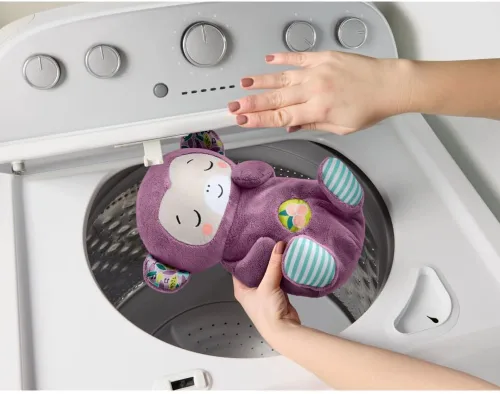 Vista 4 de Fisher-Price Juguetes para bebés Soothe ‘n Snuggle Mono púrpura de peluche máquina de sonido portátil con movimiento de respiración y luces