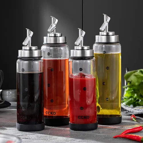 Vista 2 de CCKO Botella dispensadora de aceite de oliva de vidrio con boquillas de acero inoxidable, botella de aceite de oliva de vidrio inastillable, botella