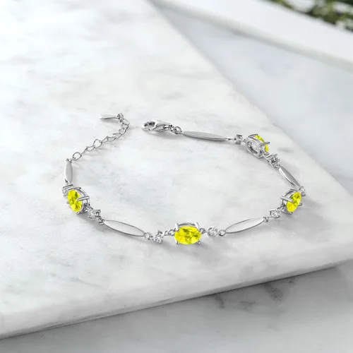 Vista 55 de Gem Stone King 925 Sterling Silver Gemstone Birthstone and White Created Sapphire Tennis Bracelet For Women Oval 7X5MM and 2MM 6 Inch + 1 Inch