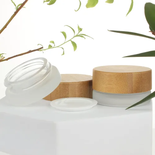 Vista 8 de COSIDEA 18 frascos vacíos de vidrio transparente redondos de 1.7 onzas fluidas con tapas de bambú, tarro de crema de madera, recipientes de viaje