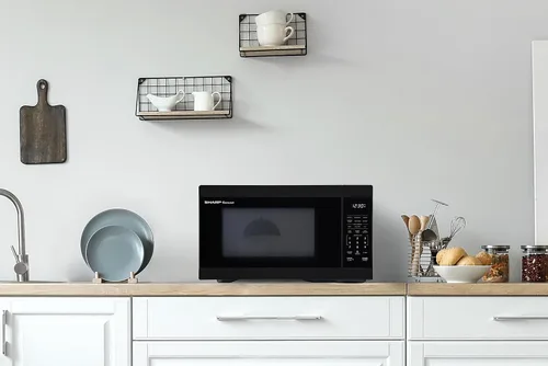 Vista 6 de Horno de microondas SHARP para mostrador con bandeja giratoria extraíble de 12.4", 1000 vatios, 1.1 pies cúbicos, color negro