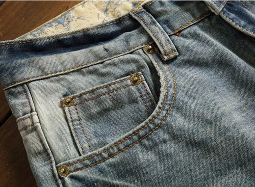 Vista 4 de Jeans rasgados de moda para hombre con parches