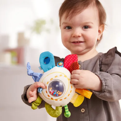 Vista 8 de HABA Mordedor Cuddly Rainbow Round - Juguete de actividad suave con elementos de sonajero y dentición, multicolor