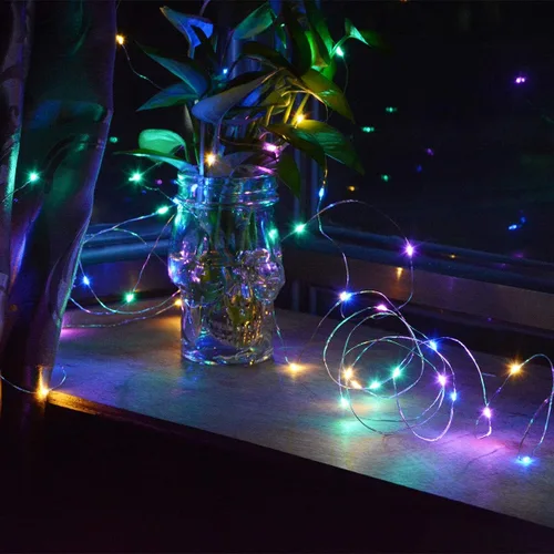 Vista 6 de Serie de 4 paquetes de 50 luces LED multicolores de Navidad, luces de cuento de hadas con batería, mini tira de luces LED alimentadas por