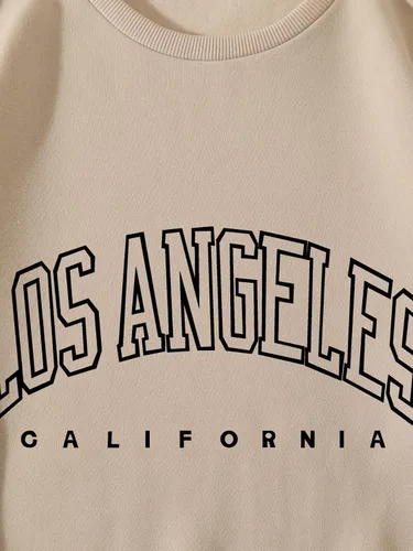 Vista 3 de SheIn Sudadera casual de manga larga con cuello redondo y hombros caídos para hombre