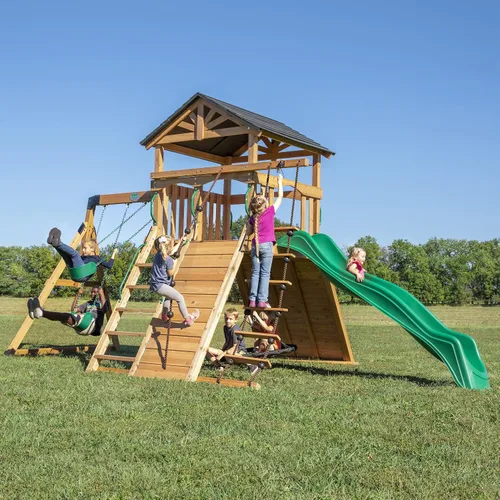 Vista 11 de Juego de columpio Backyard Discovery Endeavor de madera de cedro con tobogán de ola, plataforma de juego, doble pared de roca, escalera de cuerda