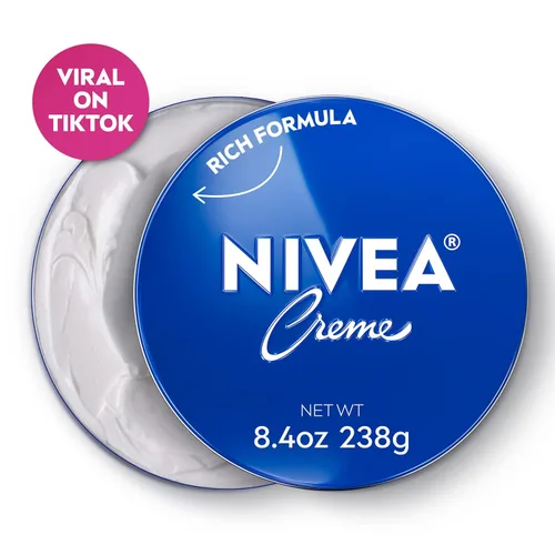 Vista 13 de NIVEA Crema hidratante para el cuerpo, la cara y las manos, fórmula alemana, rica crema hidratante corporal con provitamina B5, lata de 8.4 onzas