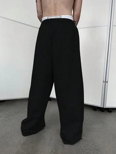Vista 2 de OYOANGLE Pantalones holgados de pierna ancha recta con cordón en la cintura para hombre, pantalones deportivos de entrenamiento con bolsillo