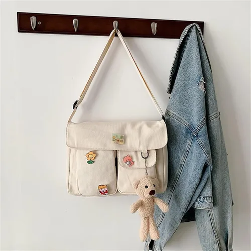 Vista 4 de Bolso cruzado de lona con pines Kawaii y colgante, multifunción, casual, lindo hombro mensajero bolsa de viaje para niñas adolescentes