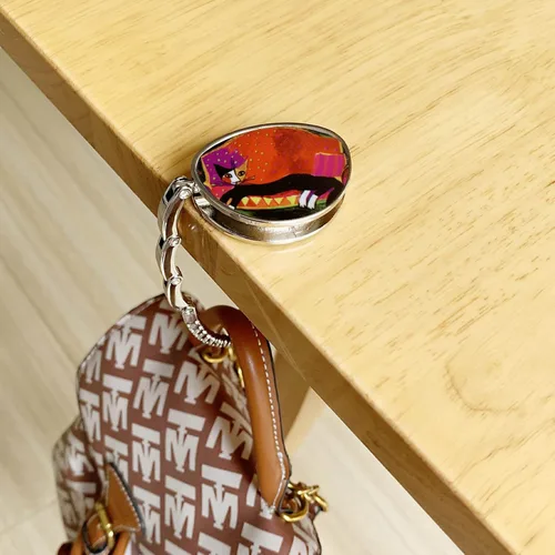 Vista 4 de Ganchos para bolsos con diseño de animales para mesa y bares, organizadores portátiles para colgar bolsos, bolsillo y almacenamiento para bolsa