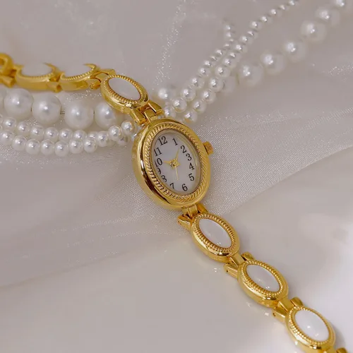 Vista 2 de ADSBIAOYE Elegante reloj de perlas para mujer, reloj de vestir con esfera ovalada, regalo, reloj impermeable para mujer 01 Oro blanco