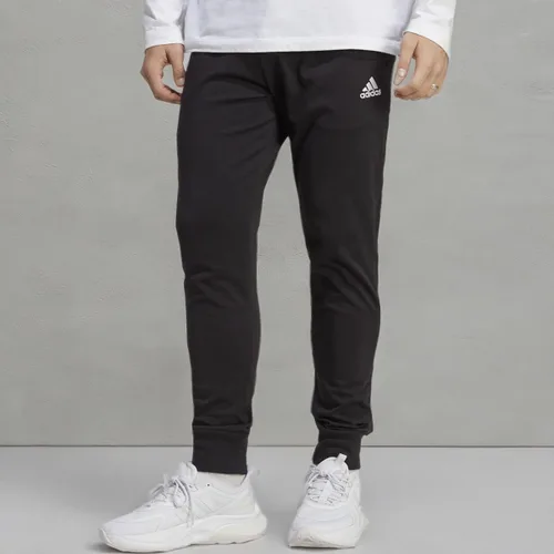 Vista 10 de adidas Pantalones Essentials de punto único con puños cónicos para hombre